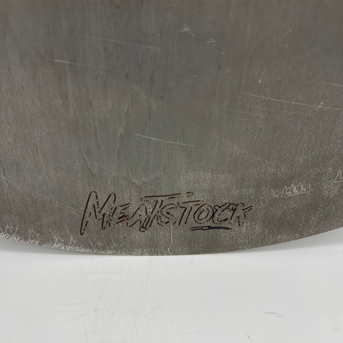 Meatstock logo to on a mild steel griddle plate