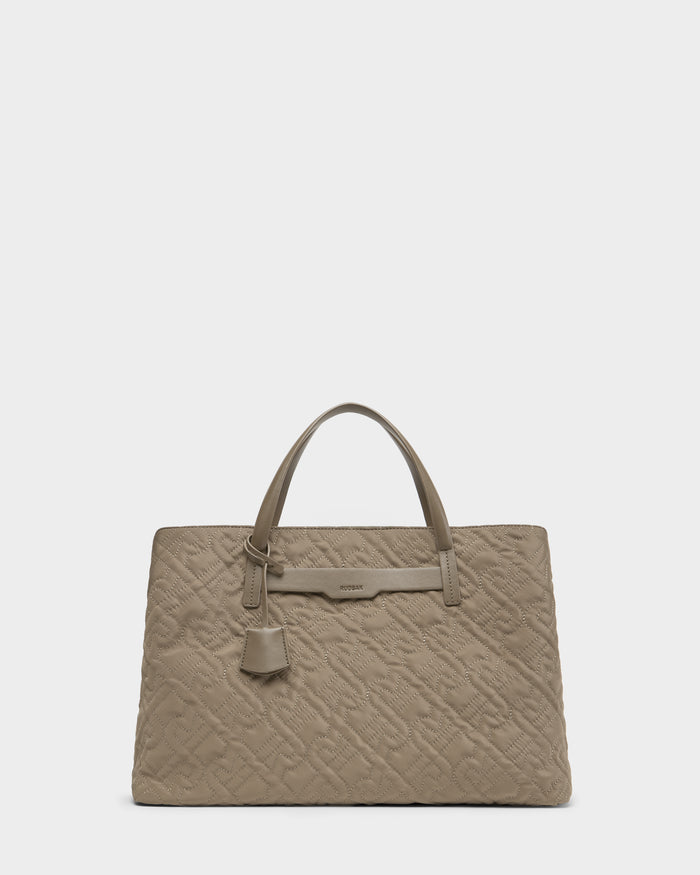 The Rudsak ASMINE - L325005 Almond tote showcases quilted taupe leather, two sturdy handles, and a chic hanging tag, elegantly presented against a plain white background.