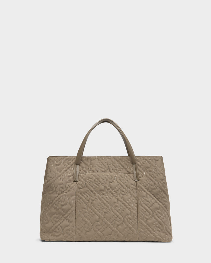 The Rudsak ASMINE - L325005 Almond is an elegant large quilted tote with two handles and a subtle embossed geometric pattern on the front, shown against a plain white background.