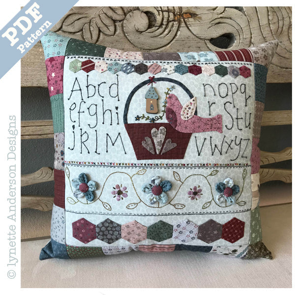 Bird in a Basket Pillow by Lynette Anderson