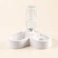 Gravity Water & Food Bowl in white on a warm ivory studio background