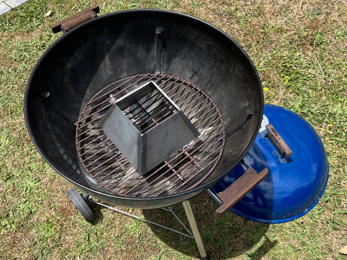 CLD Fabrication Krispy Kone kettle vortex insert sitting inside blue Weber kettle
