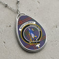 Montgomery clan Scottish tartan necklace with clan crest and Gardez Bien motto on tartan background