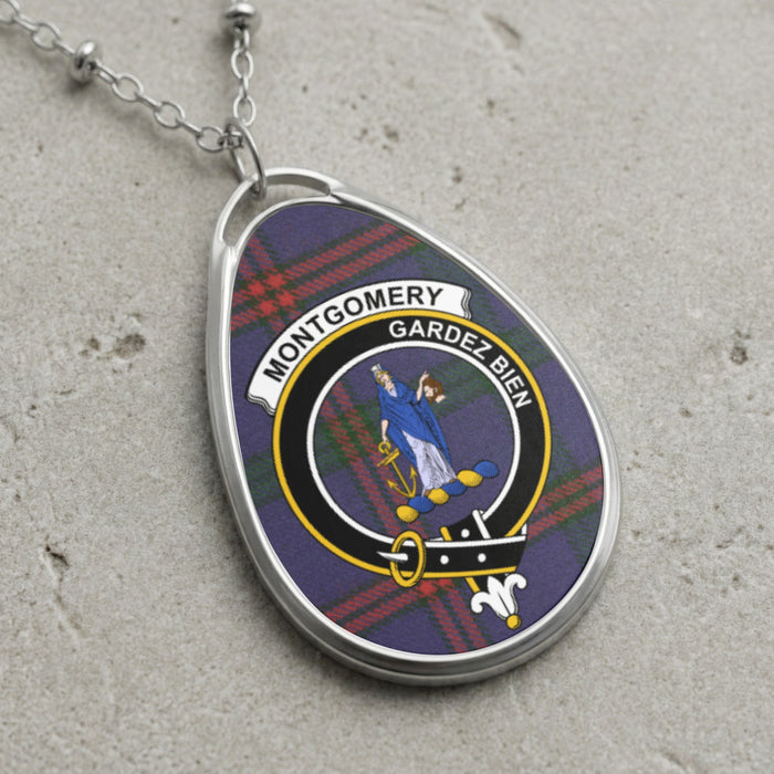 Montgomery clan Scottish tartan necklace with clan crest and Gardez Bien motto on tartan background
