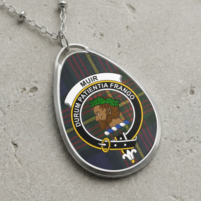 Muir clan Scottish tartan necklace with clan crest and Durum Patientia Frango motto on tartan background