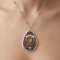 Sinclair Family Crest necklace worn at the neckline
