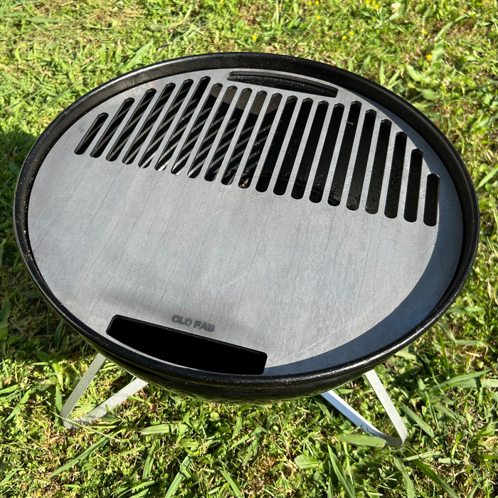 Smokey joe griddle installed with a grass background, angled view