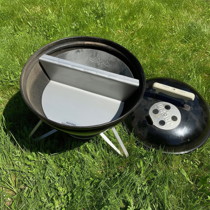 Weber Smokey Joe fitted with an offset plate and basket
