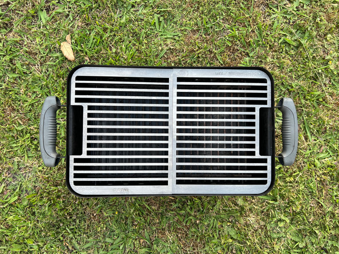 top view of both grill halves placed into a weber go anywhere