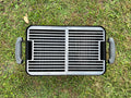 top view of both grill halves placed into a weber go anywhere