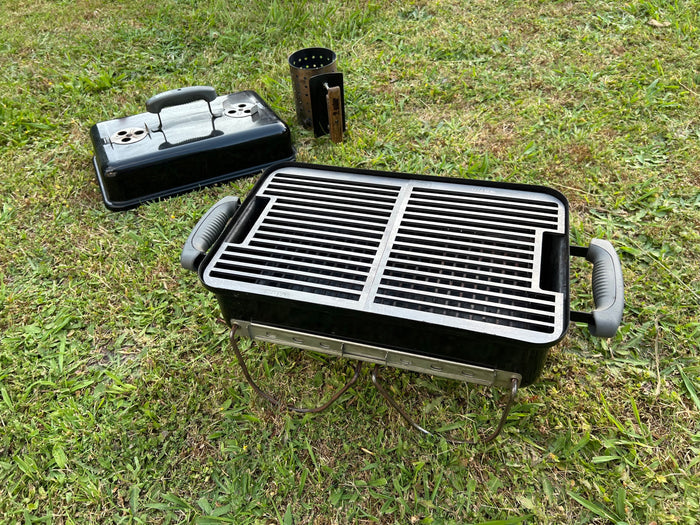 both sets of grills fitted to a weber GA with a grass background