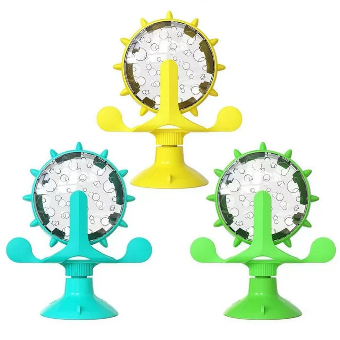 Treat-Dispensing Cat Toy shown in Green, Blue, and Yellow
