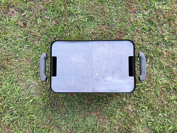 top view of the half griddle plates place into a weber ga