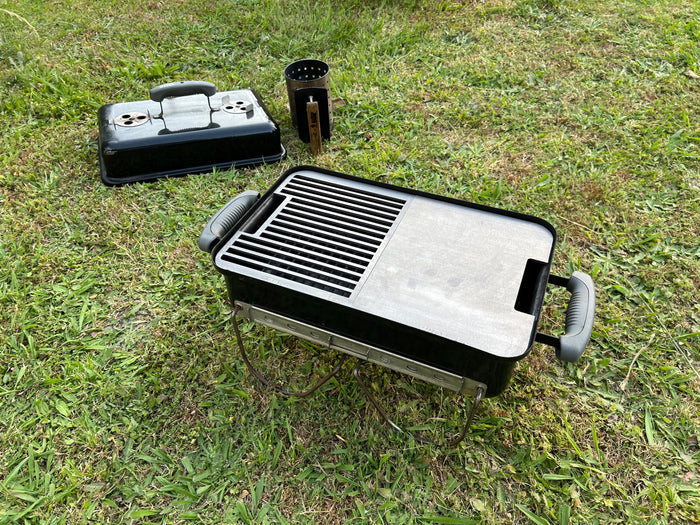 grill/plate combo shown fitted to a weber GA with a grass background