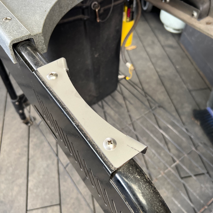 Stainless weber mounting bracket bolted to a Performer Kettle